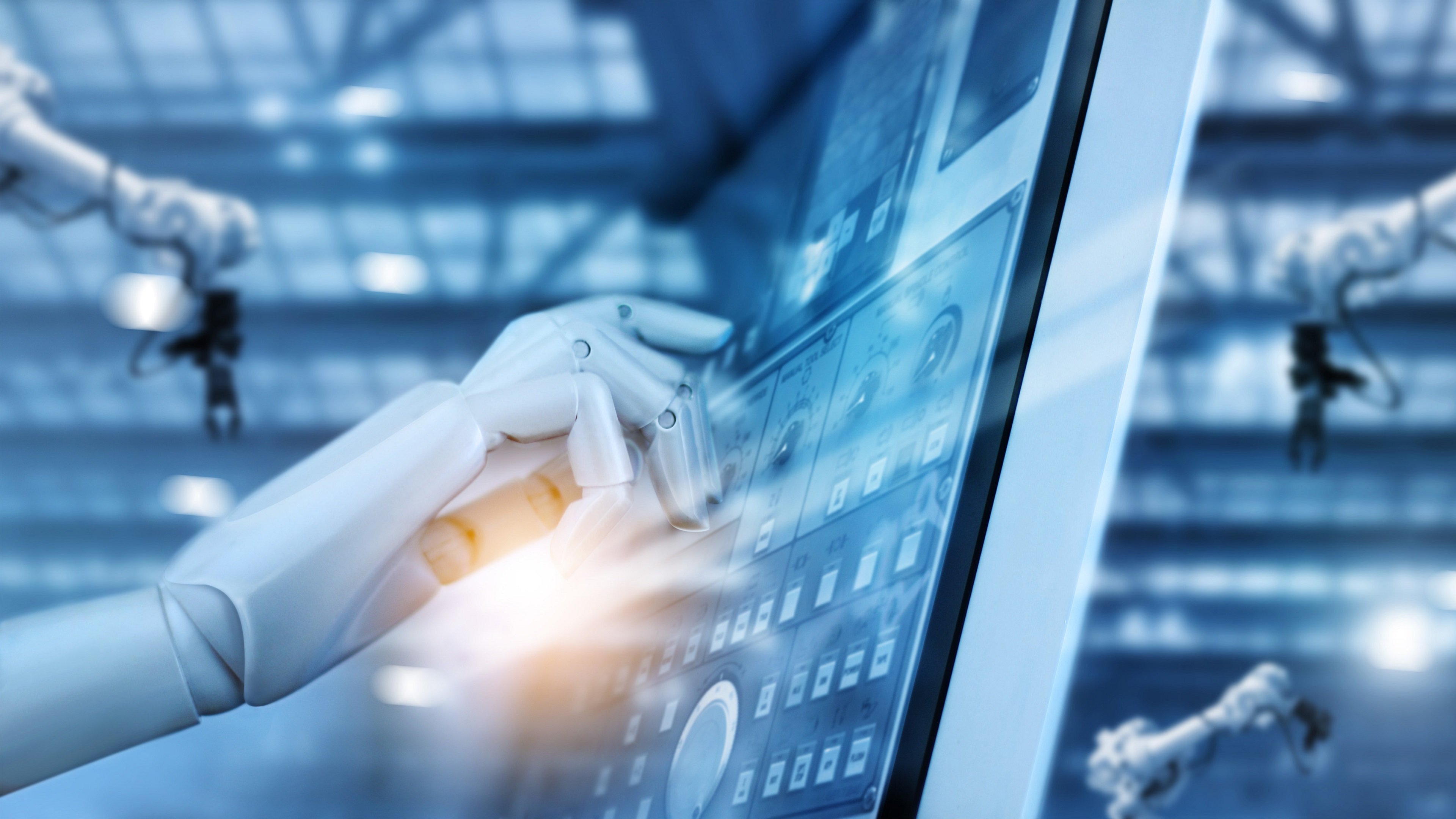 Hand robot working on control panel in intelligent factory industrial monitoring system software. Check and control automation robot arms machine. Robotics and digital manufacturing operation system
